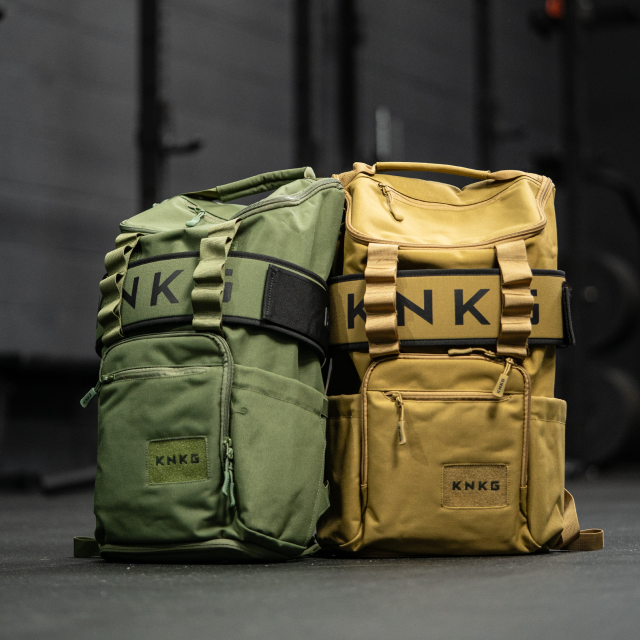Two premium gym bags side by side (green and yellow)