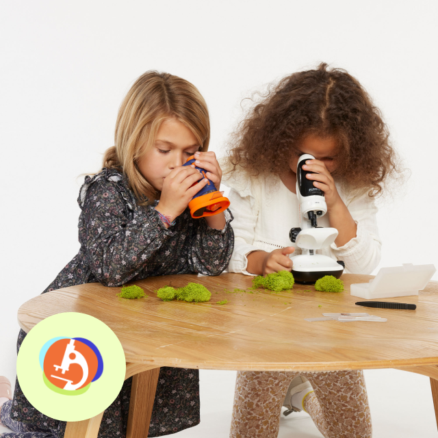 2 girls playing with stem toys